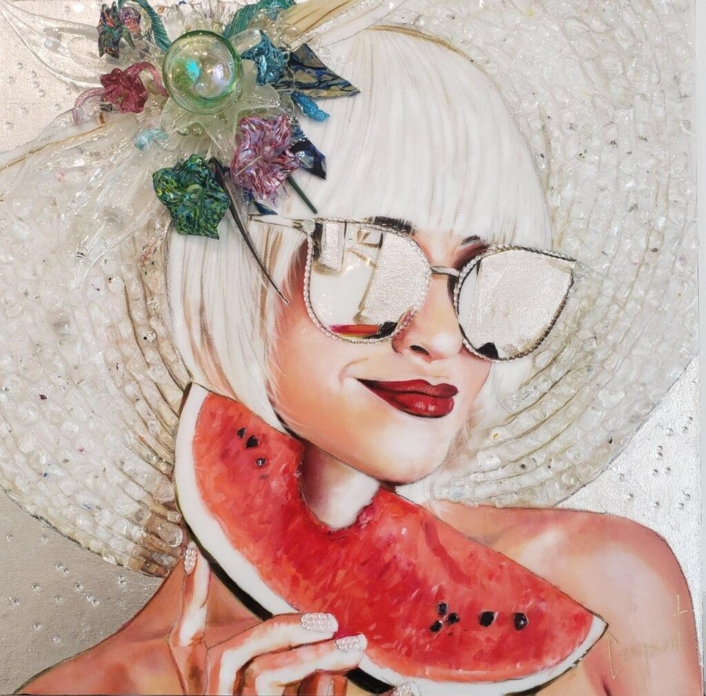 "Sandia Daze" limited edition; a lady with white bobbed hair, a wide white hat with green feathers,mirrored sunglasses, and handing a watermelon slice
