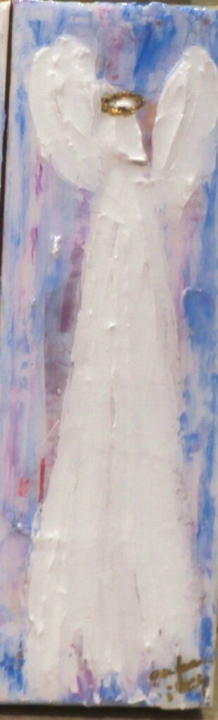 12x9 inches; a textured white angel that has been resined